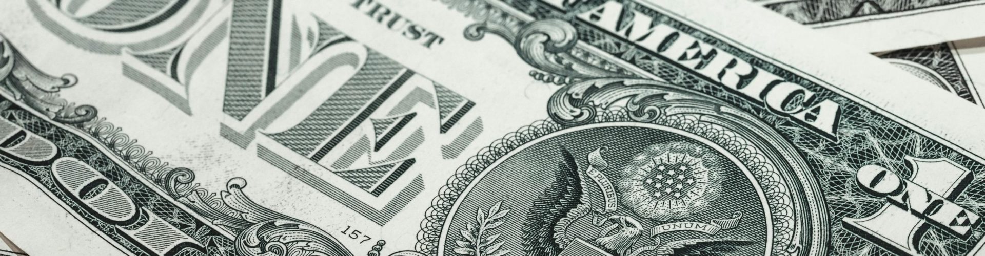 pexels-photo-164661-164661 Detailed macro shot of a United States one dollar bill showing various design elements.
